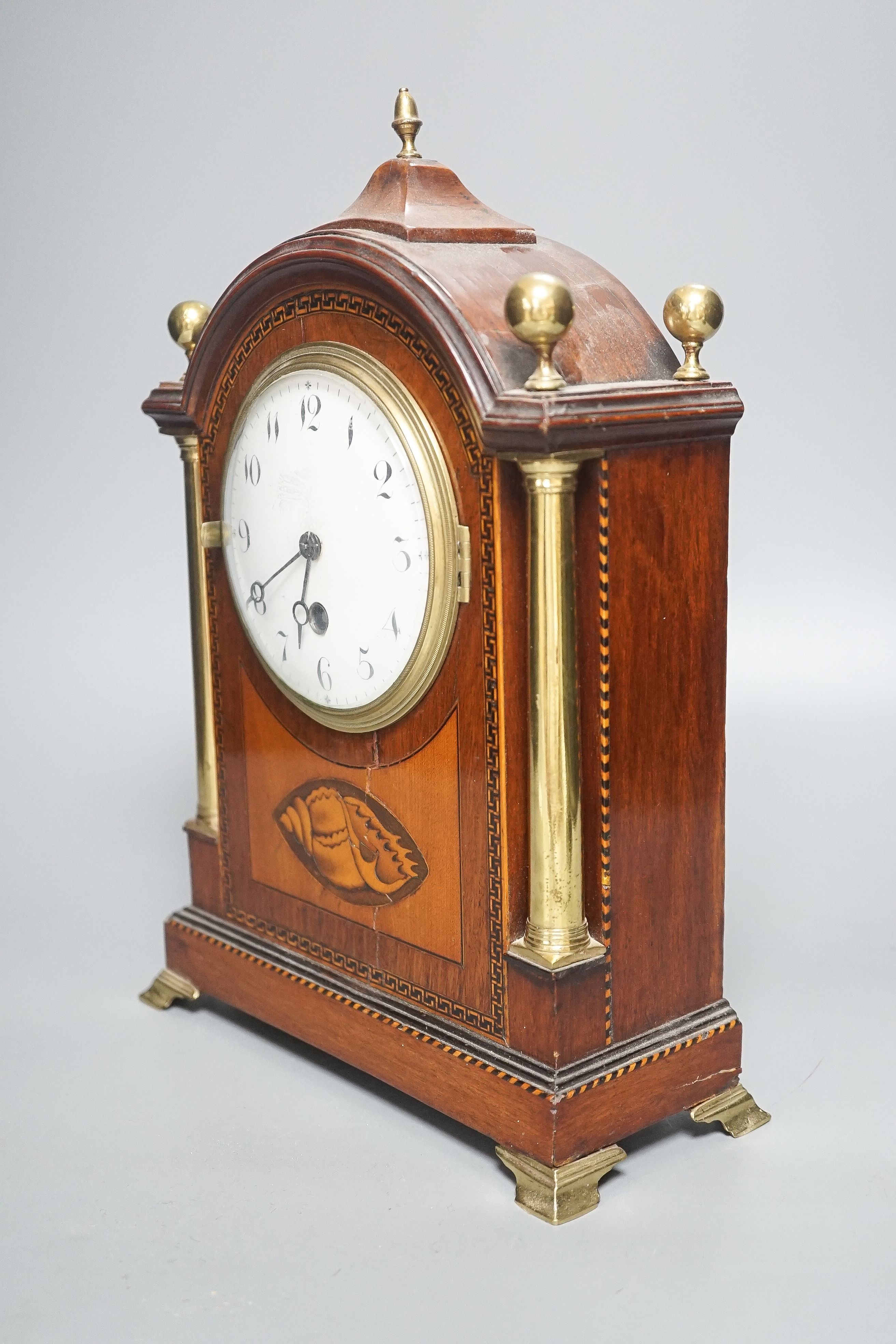 An Edwardian mahogany and marquetry arched mantel clock 30cm